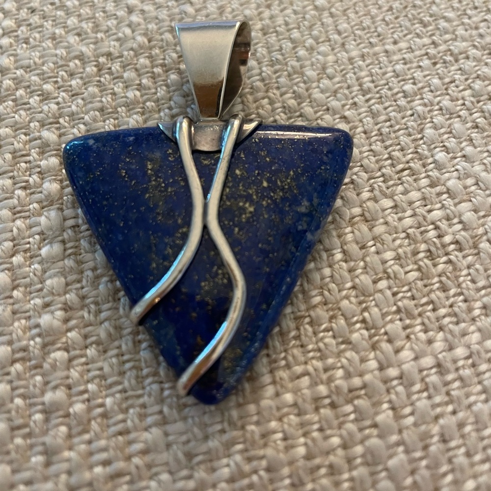 Vintage Desert Rose trading sterling silver and lapis azuli pendant